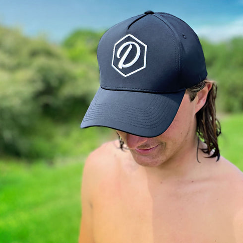 Black 5 Panel Cap with White Thread D&H Icon, modelled by Blake (thanks, Blake!)
